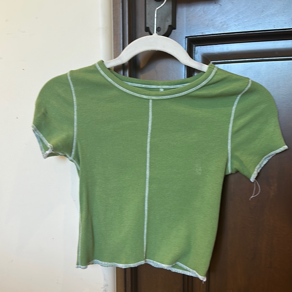 Green tee shirt with white lining